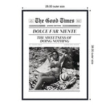 Black and white framed print styled as a vintage newspaper cover titled The Good Times featuring a woman relaxing on textured blankets wearing sunglasses and a patterned bikini with a hat nearby.