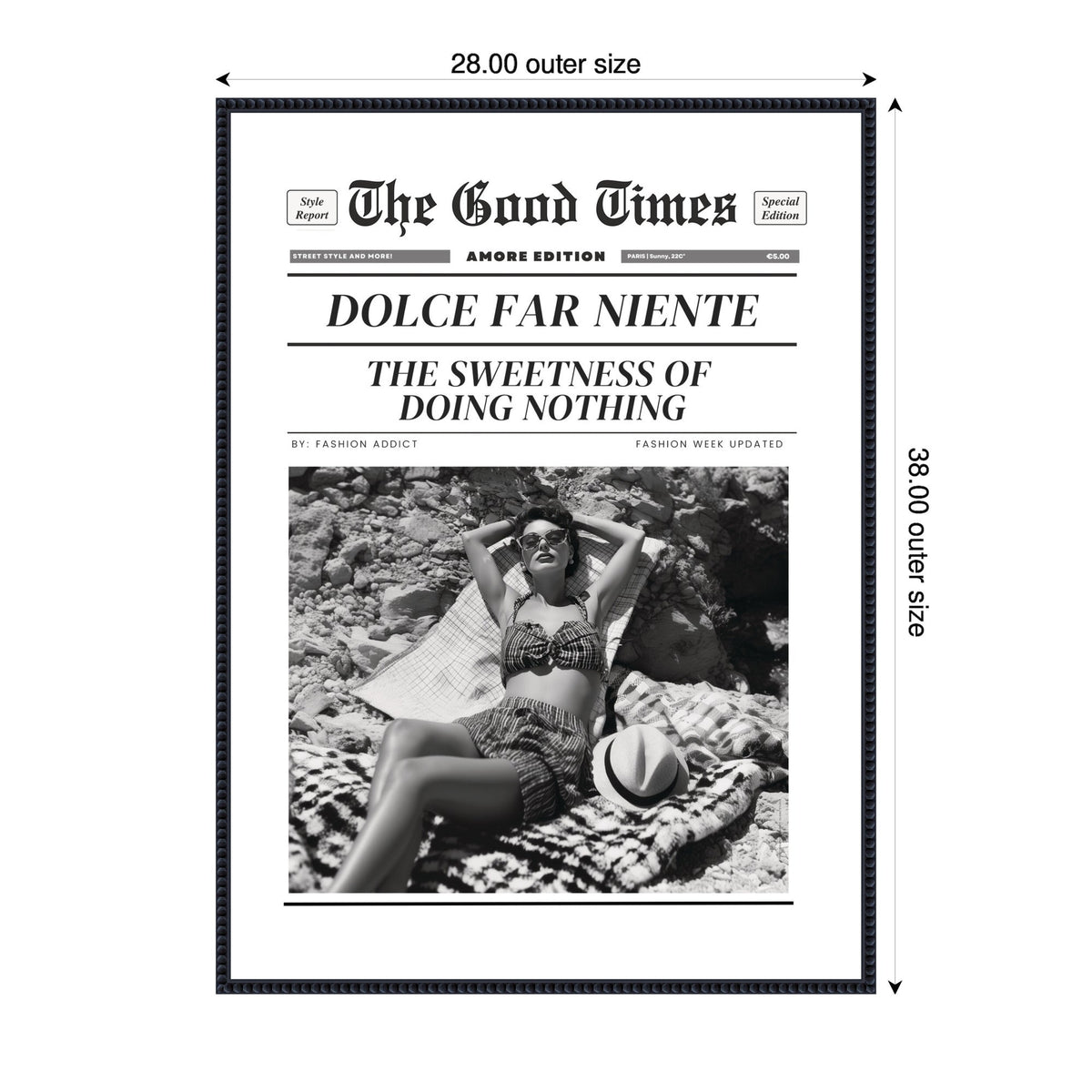 Black and white framed print styled as a vintage newspaper cover titled The Good Times featuring a woman relaxing on textured blankets wearing sunglasses and a patterned bikini with a hat nearby.