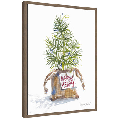 Framed canvas artwork showing watercolor small Christmas tree in burlap sack labeled 'Merry Merry'