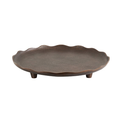 Alessia Decorative Tray in bronze finish displaying its textured surface and deckled edge on a wooden table.