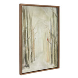 Vertical winter forest path with bare trees dusted in snow and a single red cardinal perched on a branch, framed in a simple wood frame.
