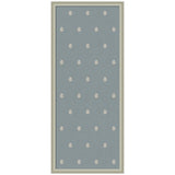 Rectangular pinboard with a muted blue fabric surface featuring evenly spaced small white botanical block print motifs, framed in light gray wood with a simple profile.