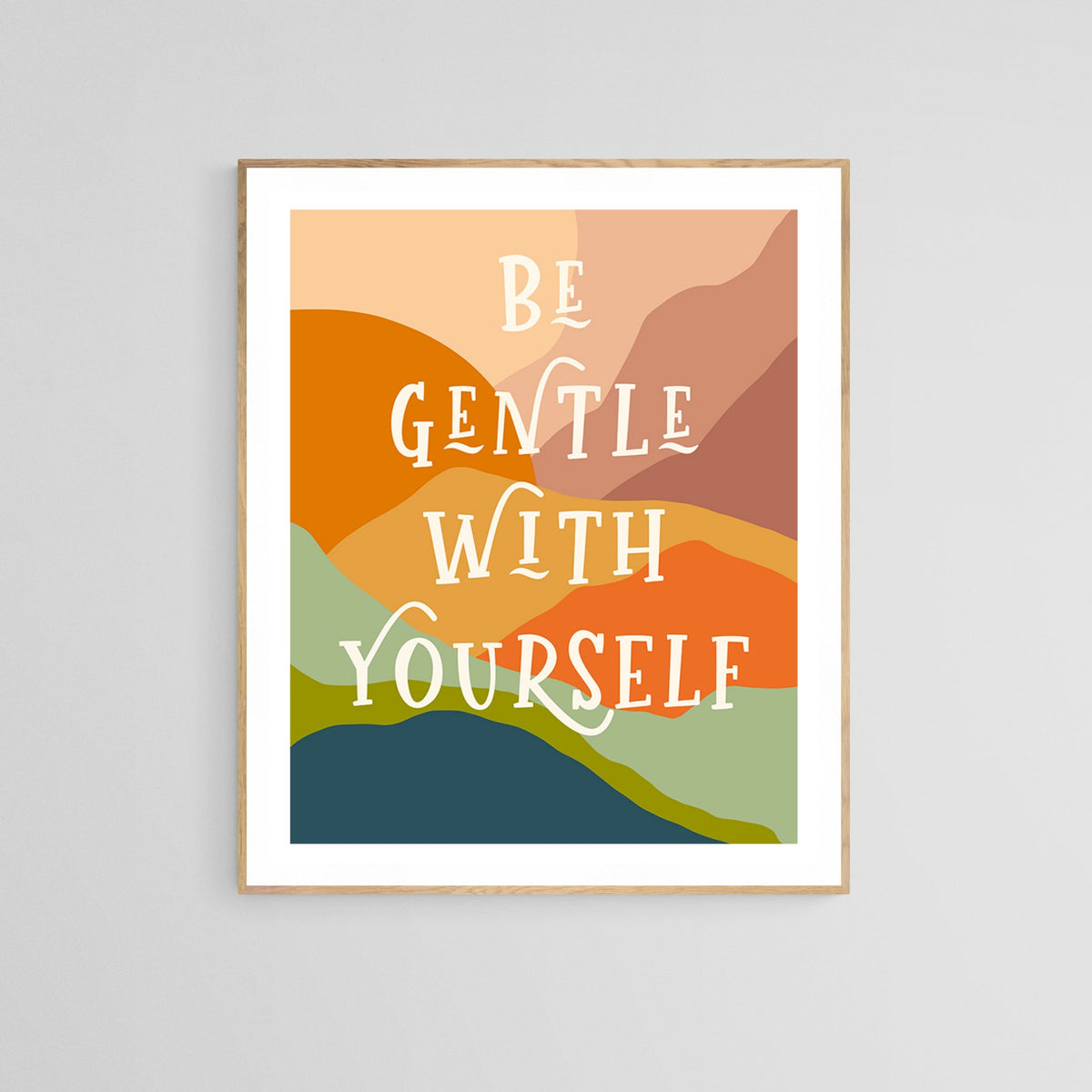 Typography art print with the phrase 'Be Gentle With Yourself' in white, set against abstract shapes in muted orange, green, blue, and brown tones.