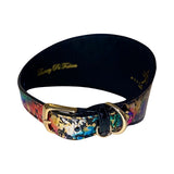Wide collar with rainbow-colored abstract pattern and gold hardware including buckle and D-ring, with black interior lining featuring gold lettering.