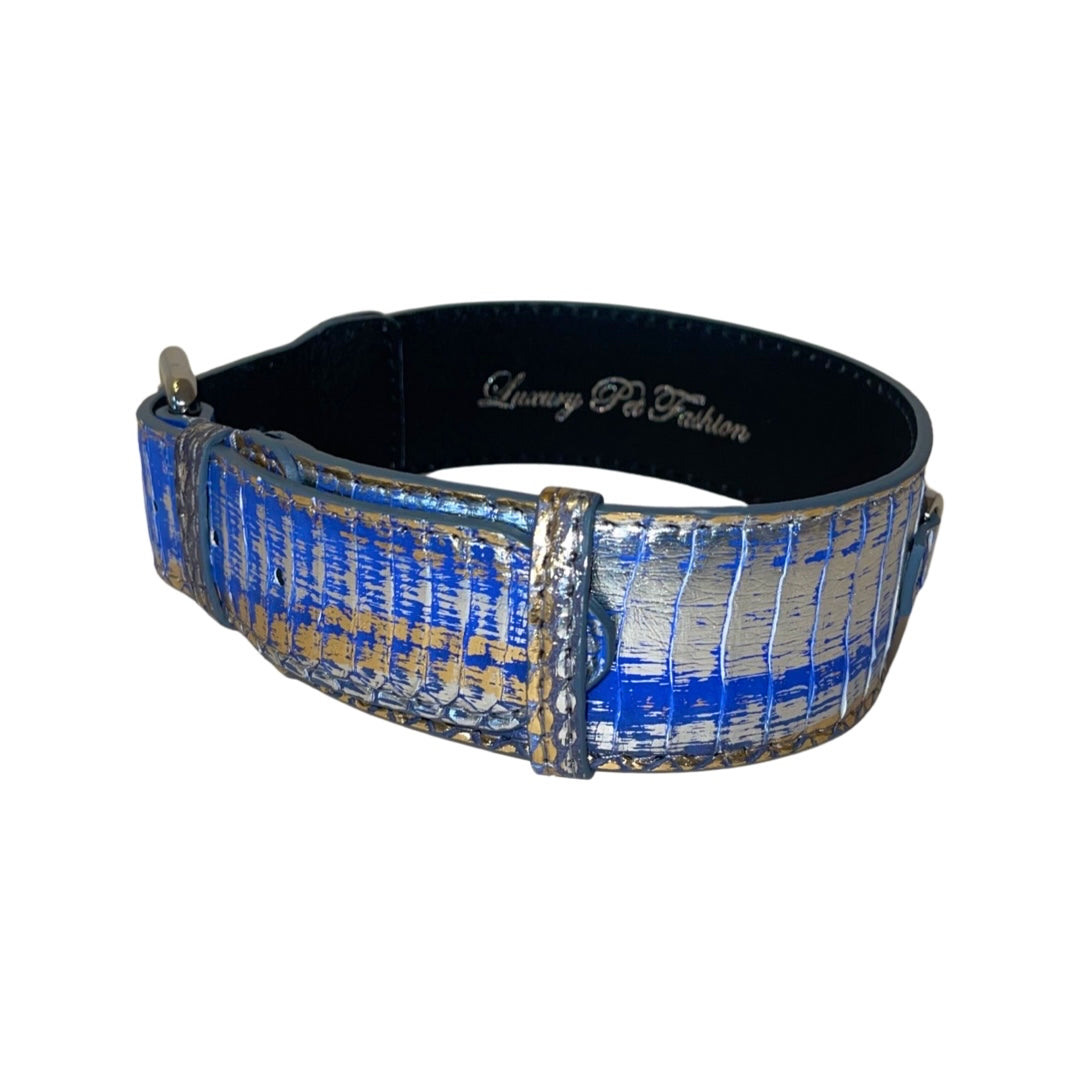 Blue, silver, and gold textured snake-pattern collar with silver hardware and black inner lining, shown at a slight angle on a plain white background.