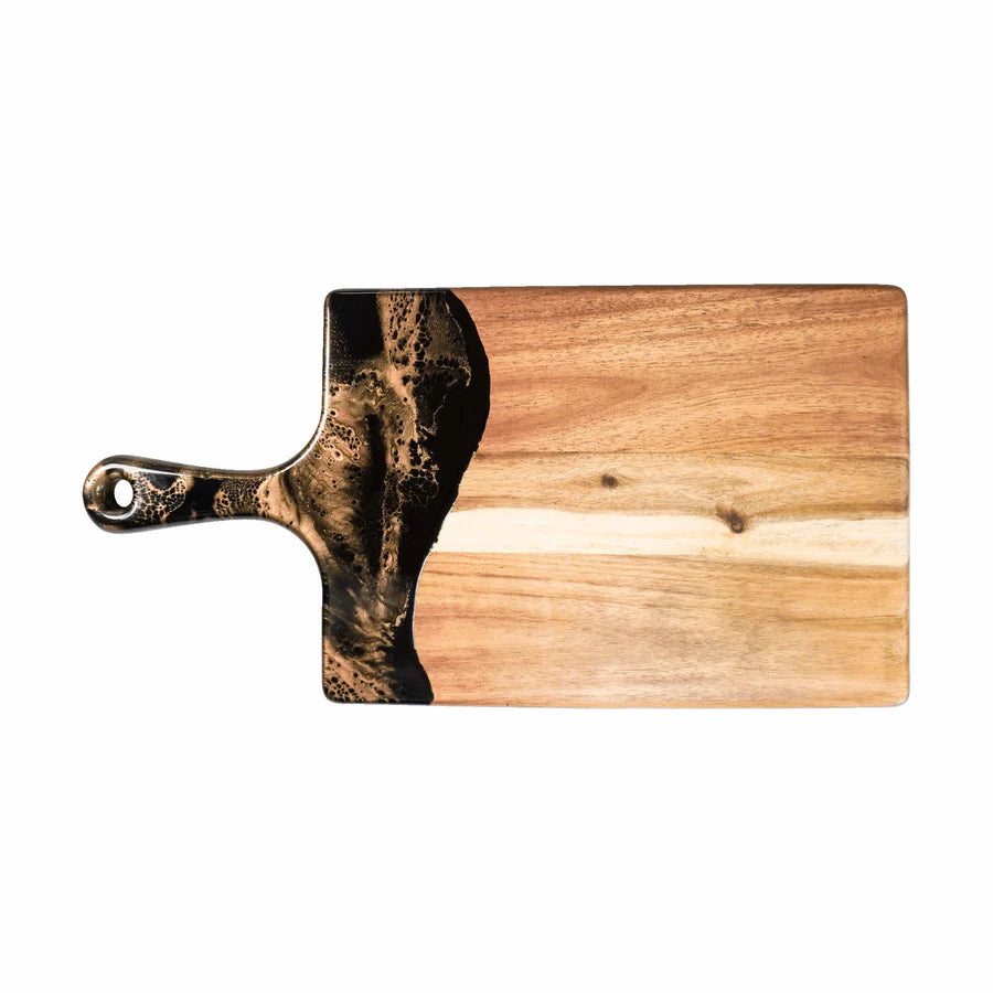 Wooden resin charcuterie board with a black handle on a white background
