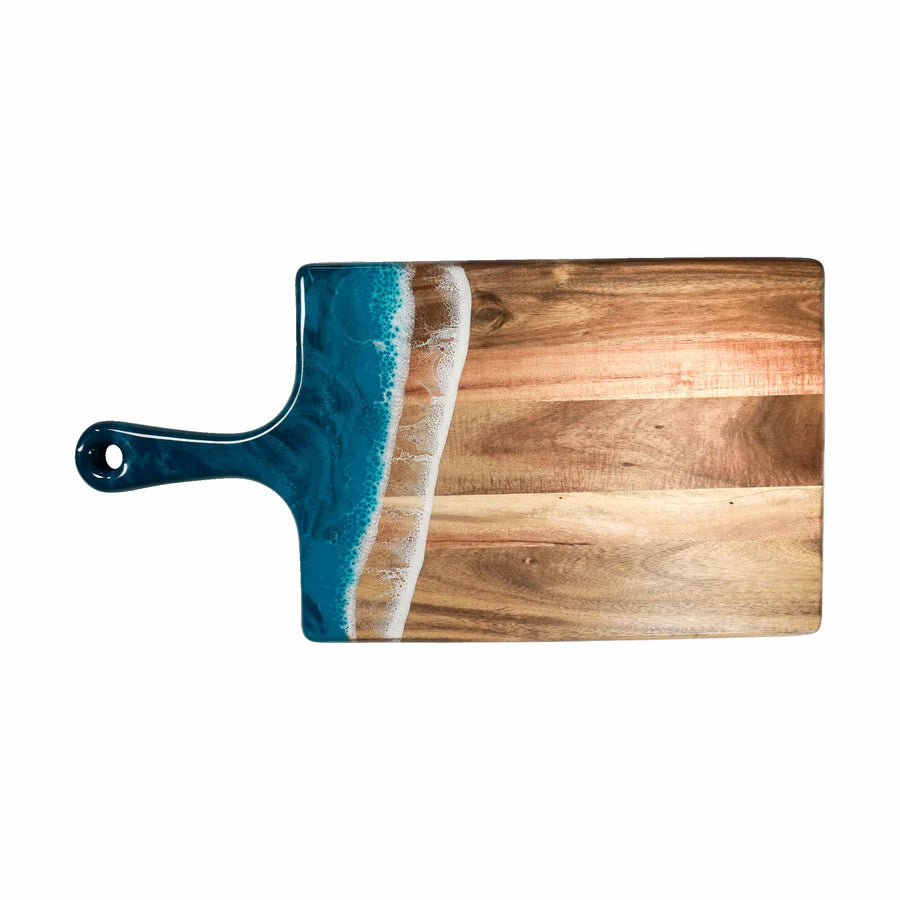 Wooden resin charcuterie board with a blue handle on a white background