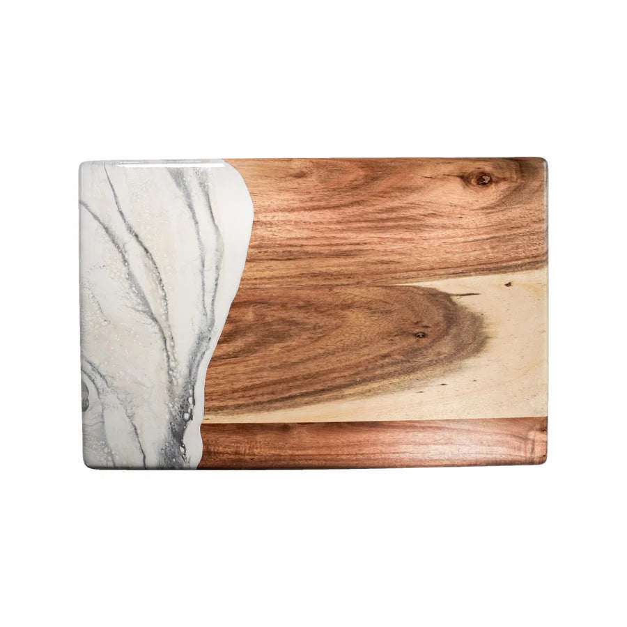 acacia resin serving bread board with marble inlay on a white background