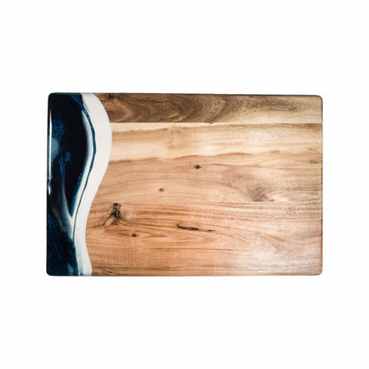 acacia resin serving bread board with a blue and white resin edge on a white background