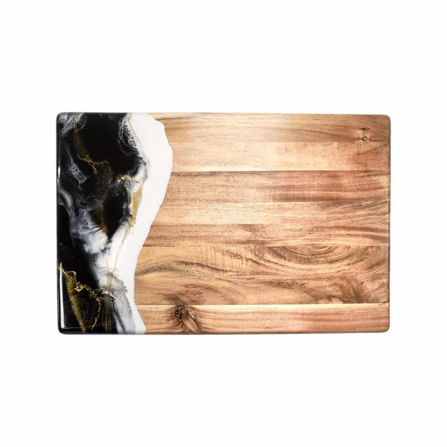 acacia resin serving bread board with black and gold abstract design on a white background