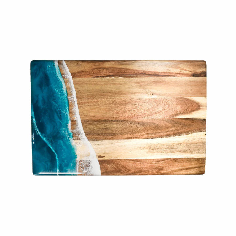 acacia resin serving bread board with a blue resin design on a white background