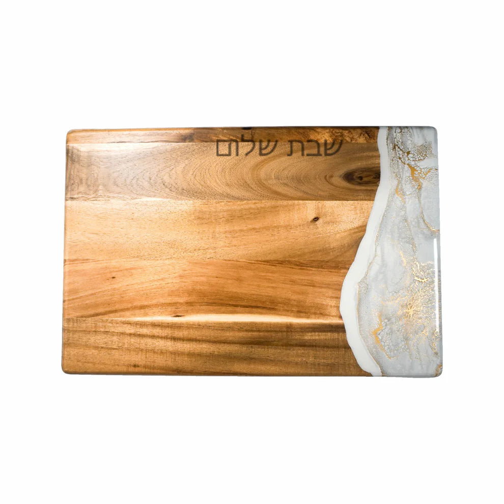 Wooden resin charcuterie board with marbleized edge on a white background