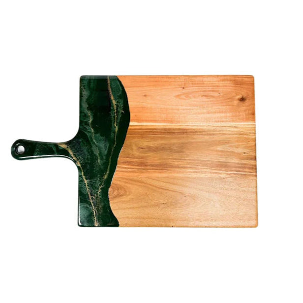 Wooden charcuterie serving tray with a green handle on a white background