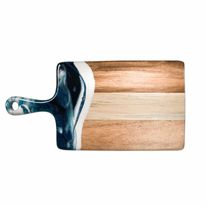 Wooden resin charcuterie board with a decorative handle on a white background