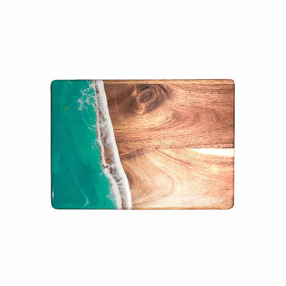 Wooden resin charcuterie board with teal resin design on a white background