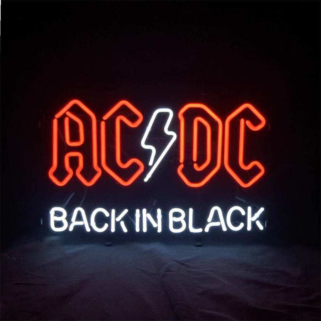 AC DC Back in Black Neon Sign in black and white illuminated on a metal grid backing