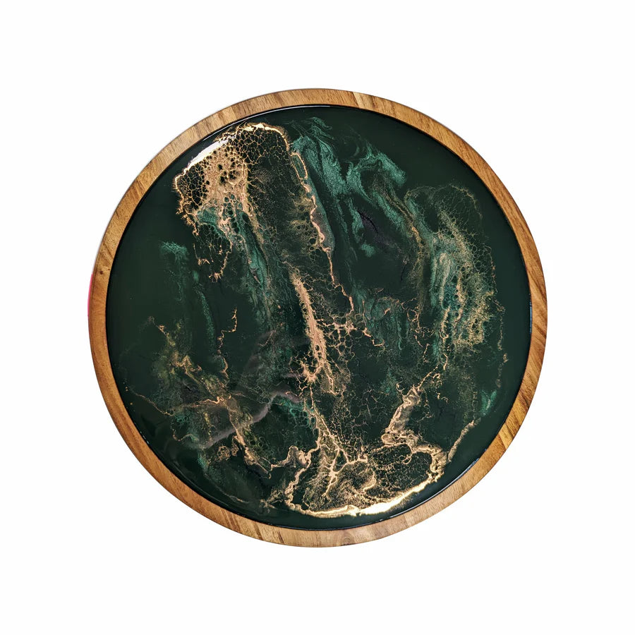 Round resin lazy susan tray with green and gold marbled design on a wooden rim