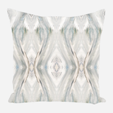 Square pillow with a symmetrical abstract pattern resembling mirrored soft brush strokes in shades of gray, white, and subtle blue tones.