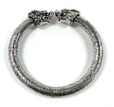 Antique Norse Bracelet with two lion heads and leaf pattern visible