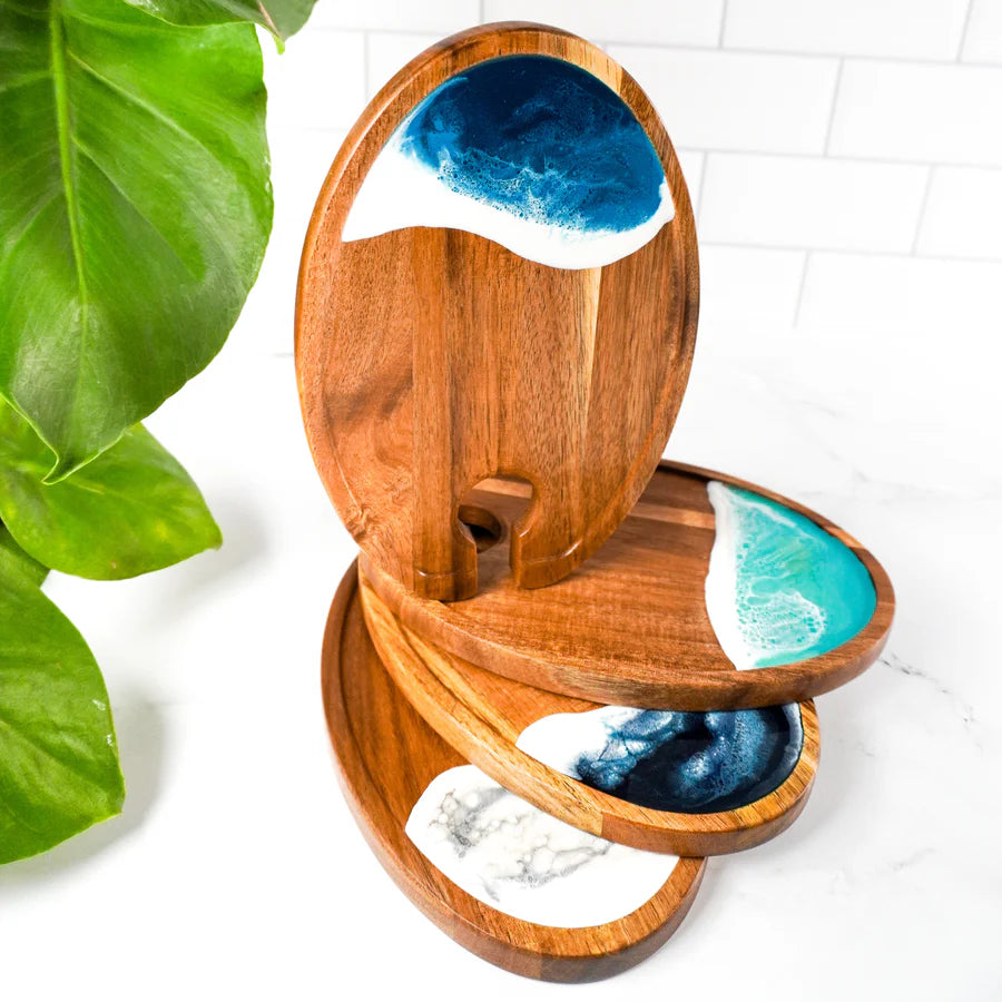 Wooden resin Wine & Appetizer Trays with blue and green resin design on a white background