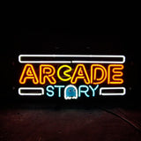 Neon sign displaying 'ARCADE STORY' with 'ARCADE' in orange and yellow, and 'STORY' in light blue, featuring a small blue ghost icon below the letter 'O'.