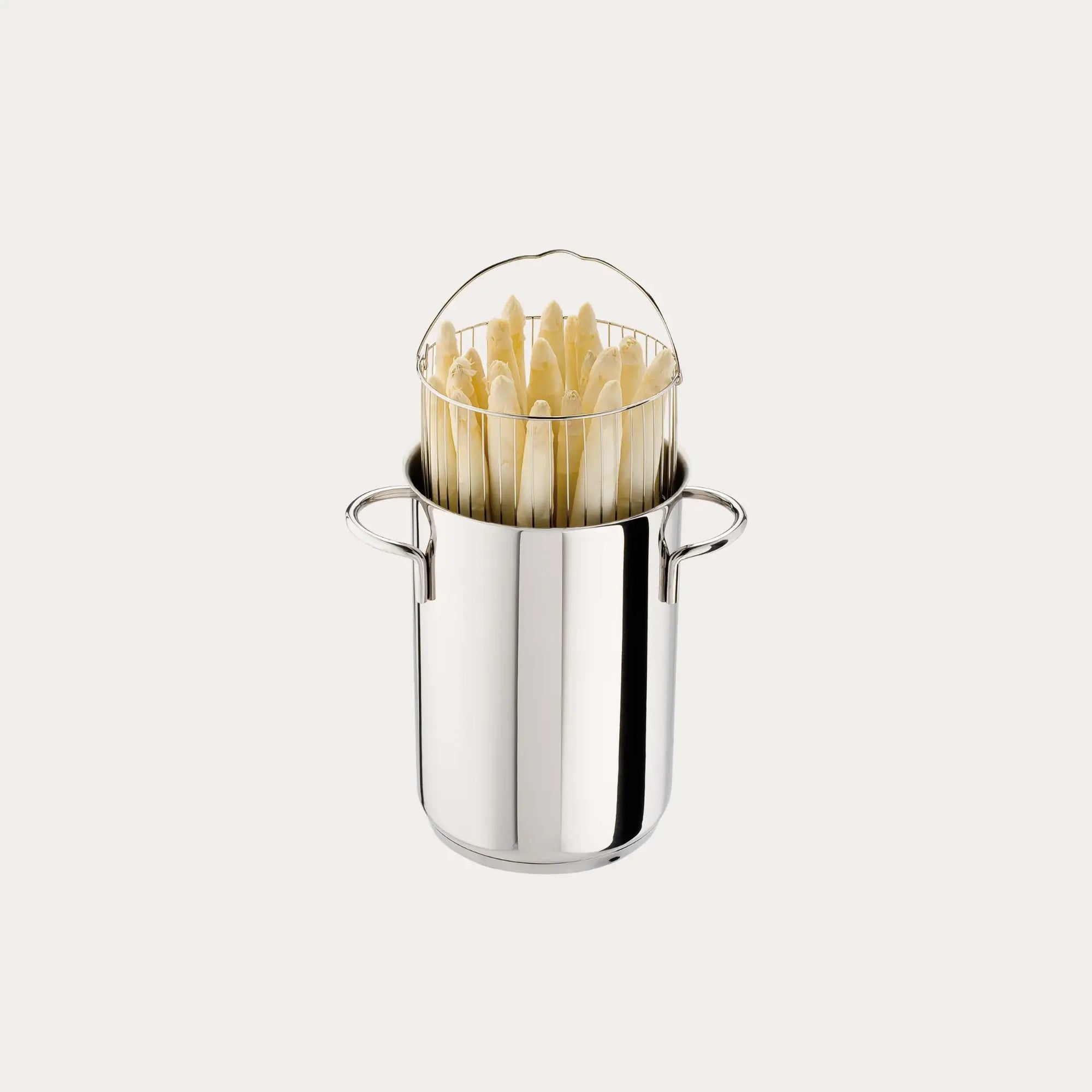 CRISTEL USA asparagus pot with glass lid shown from front angle in kitchen setting