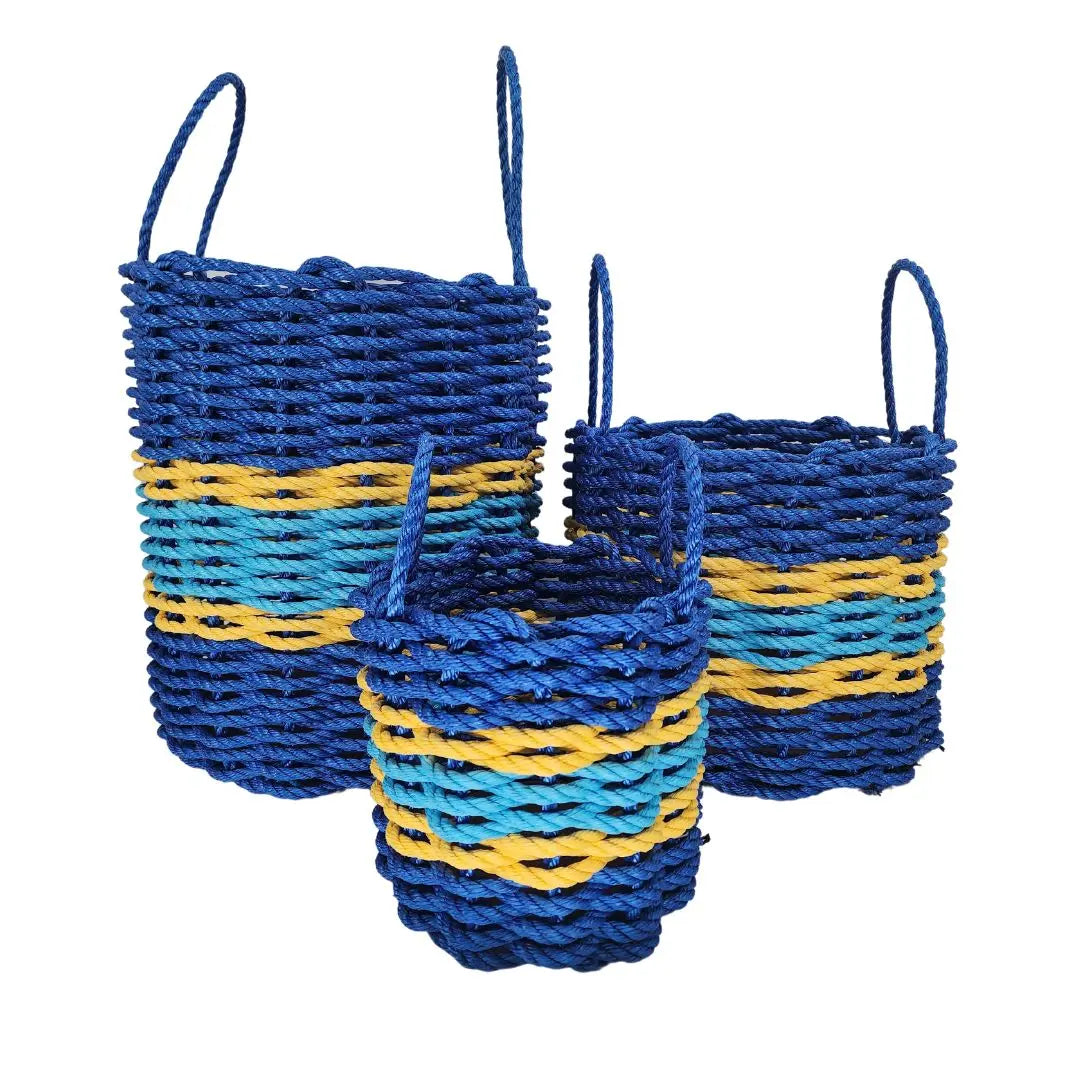 Handmade storage basket woven from authentic Maine lobster rope in two-tone blue with yellow accents