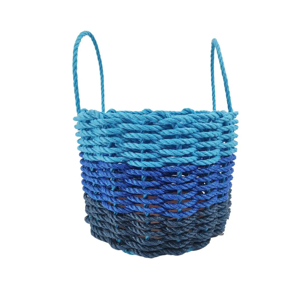 Handwoven storage basket made from navy blue, blue, and light blue Maine lobster rope