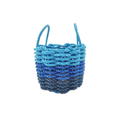 Handwoven storage basket made from navy blue, blue, and light blue Maine lobster rope