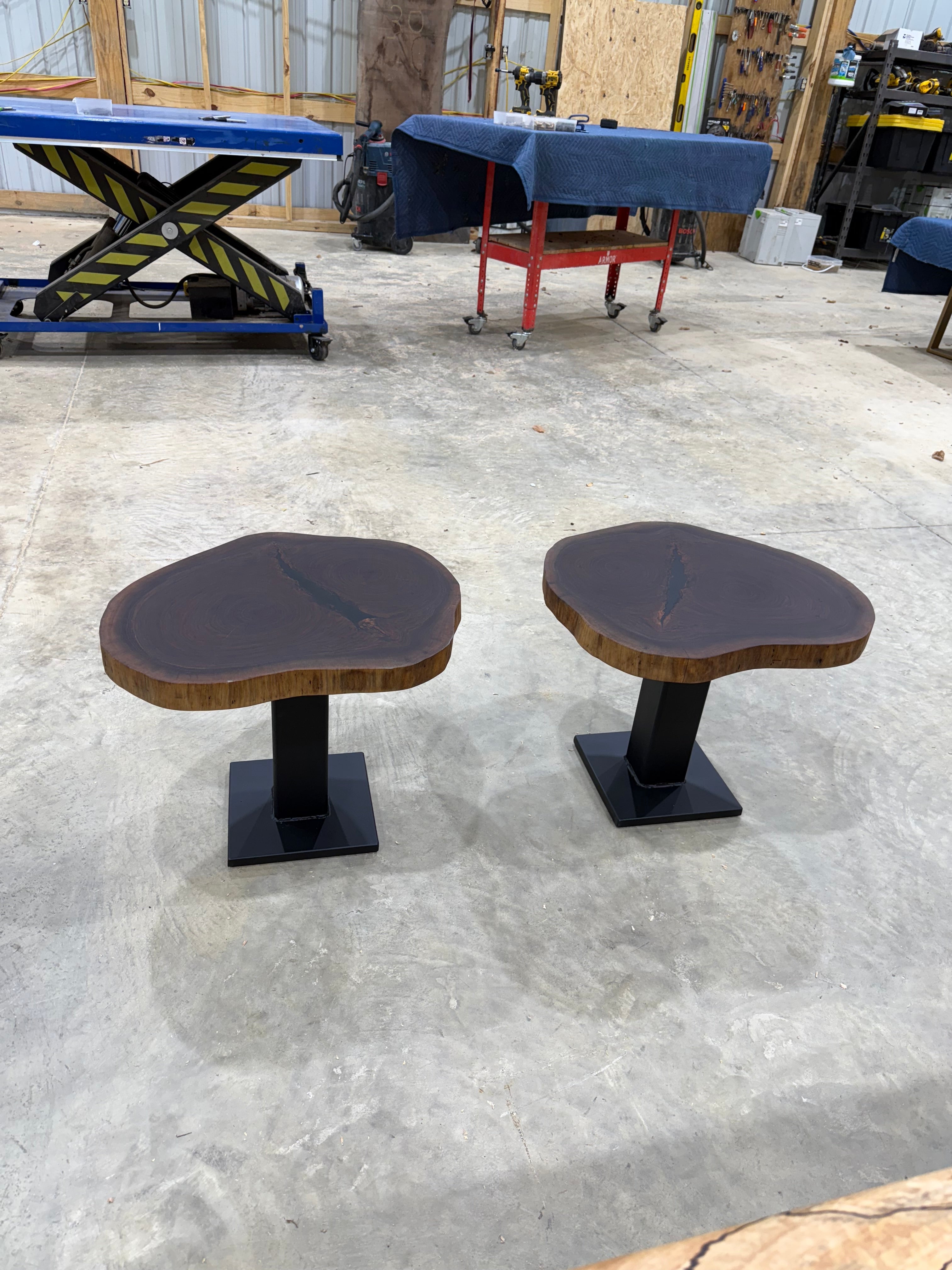 Walnut Cookie Side Tables with thick steel bases, handcrafted by Sasquatch Tables LLC