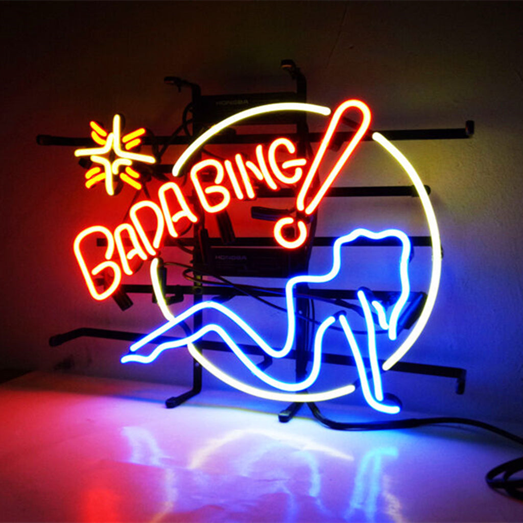 Bada Bing Girl Neon Sign glowing indoors with metal grid backing