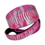 3-inch wide dog collar with iridescent pink snake skin pattern featuring white and light blue highlights, displayed coiled with visible texture and sheen.