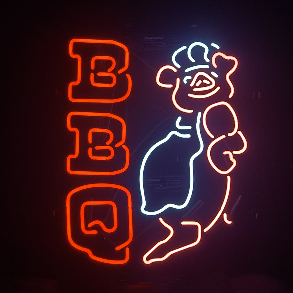 BBQ Pig Chefs Neon Sign glowing pink with metal grid backing