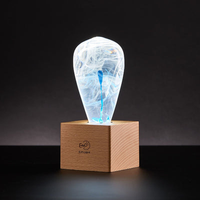 EP Light BlueDrop Resin Table Lamp with wooden base and glowing LED bulb