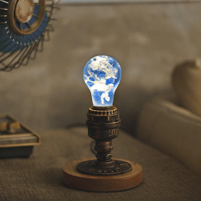 Handcrafted blue hydrangea resin LED bulb with wooden base