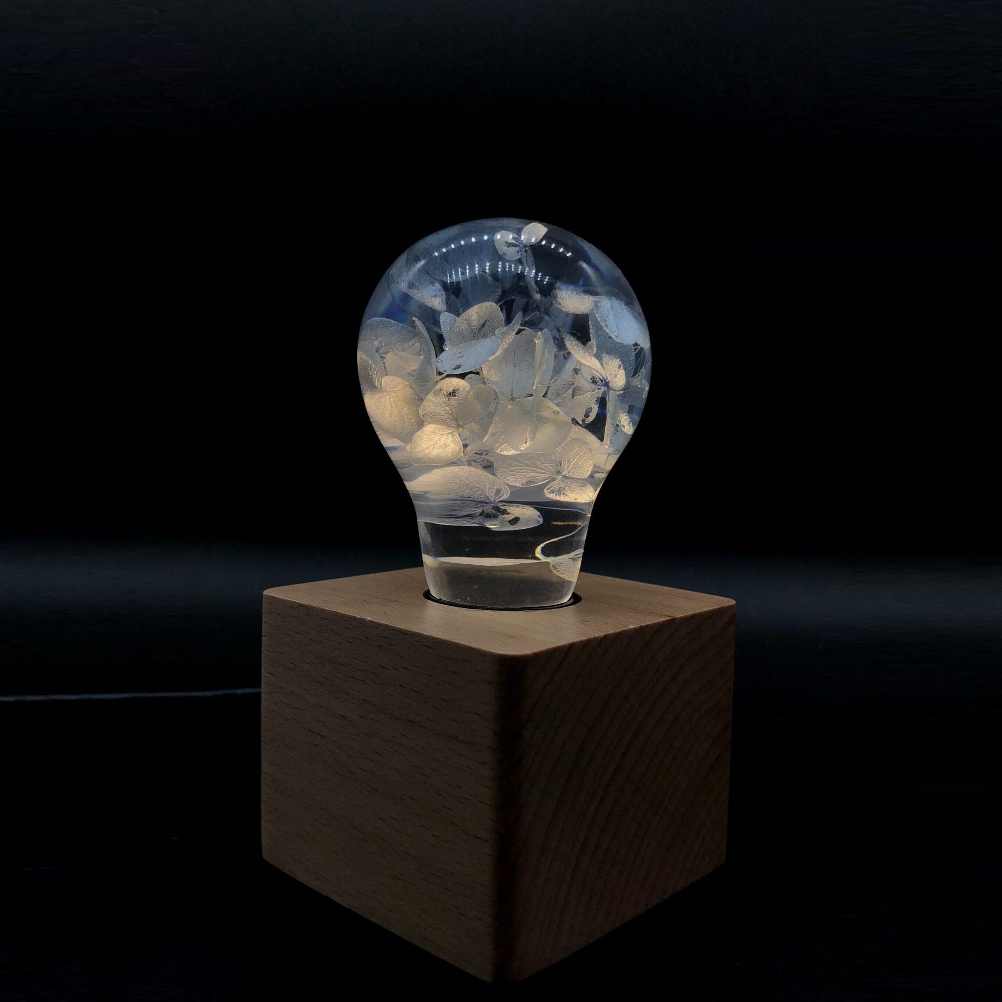 Handcrafted blue hydrangea resin LED bulb with wooden base