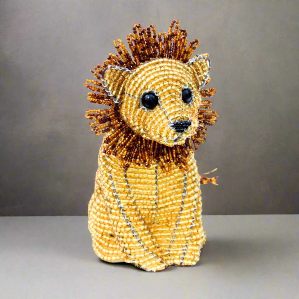 Whimsical beaded Baby Lion figurine in natural colors