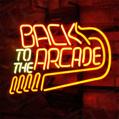 Back to The Arcade Neon Sign featuring bright neon pink lettering with a black metal grid background