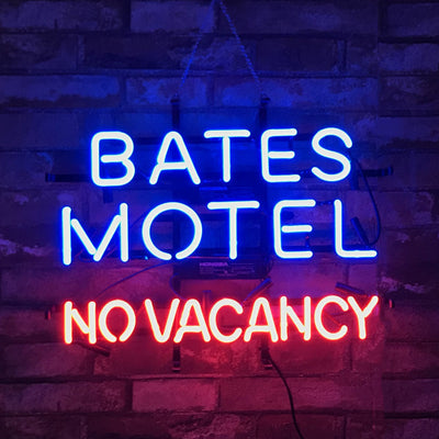 Bates Motel No Vacancy Neon Sign glowing against a dark backdrop