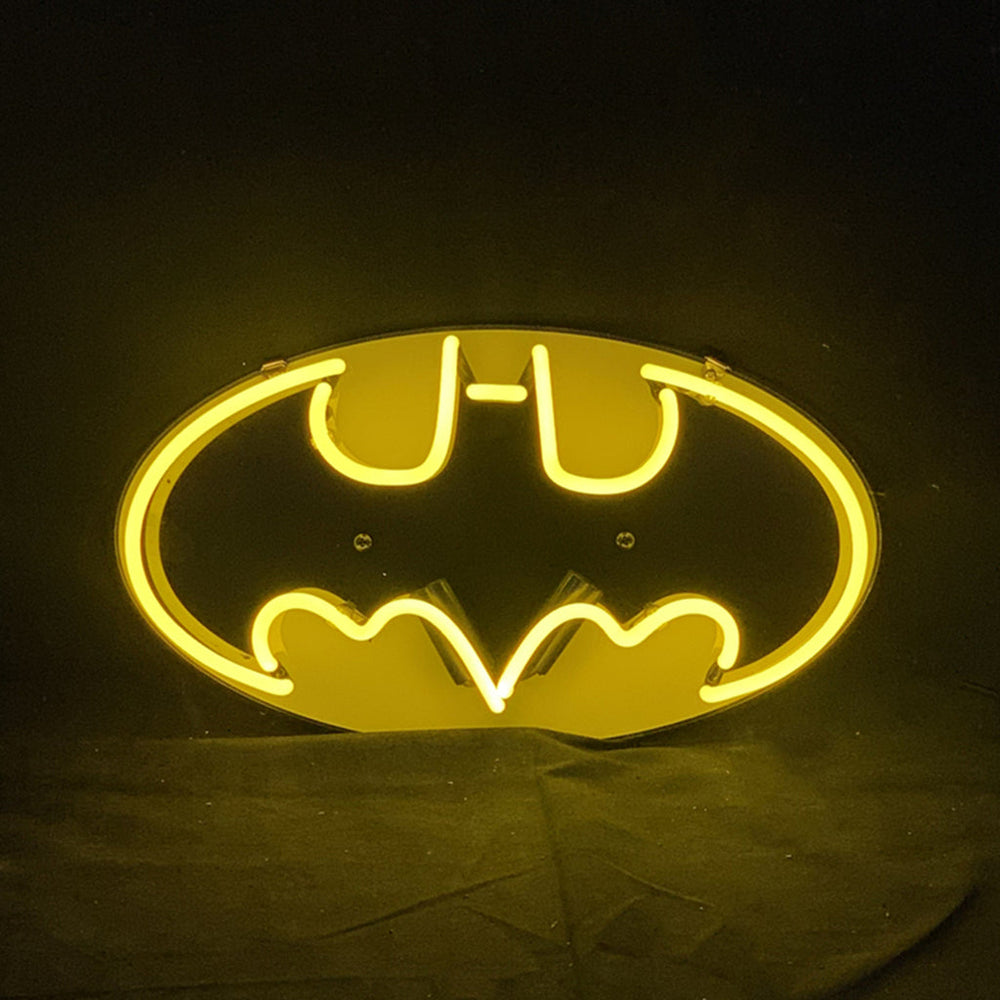 Batman Bat Neon Sign glowing on wall