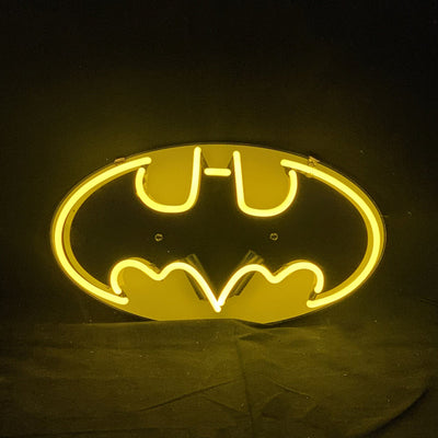 Batman Bat Neon Sign glowing on wall