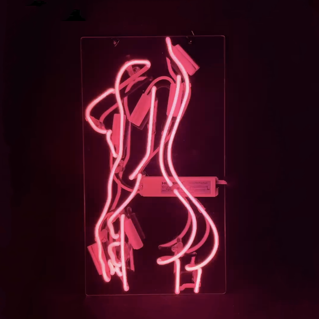 Beauty Live Nudes Girl Neon Sign glowing pink mounted on white wall