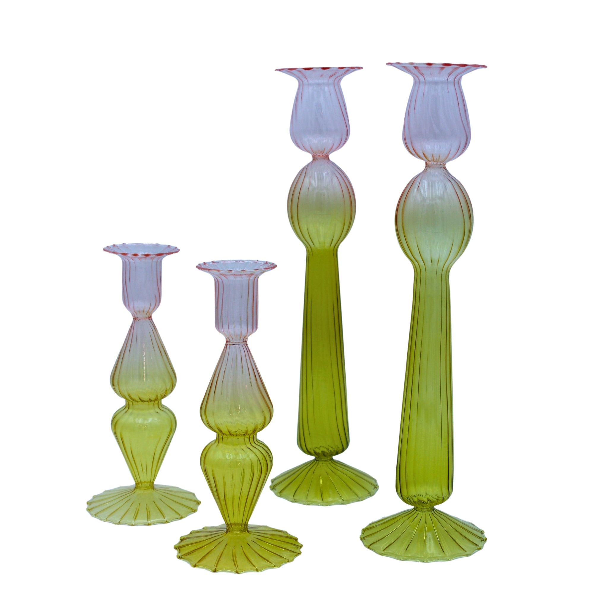Set of four dual-toned glass candle holders with ribbed texture and green to pink gradient