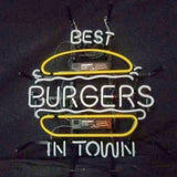 Neon sign shaped like a burger with white letters reading 'BEST BURGERS IN TOWN' and yellow lines representing the bun on a dark background