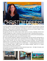 Portrait of Christi M. Dreese sitting in front of her vibrant blue and yellow seascape painting with a guitar visible to the side in a studio setting.