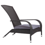 Black resin wicker lounge chair with curved armrests and a gray cushioned seat, featuring an angled backrest and metal-capped legs.