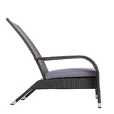 Black wicker lounge chair with a gently reclined backrest and a light gray seat cushion, featuring angled legs with silver caps.