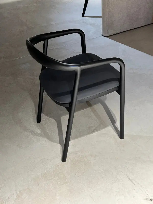 Luxury solid wood chair made of walnut with natural finish