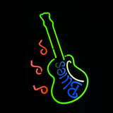 Green neon outline of an electric guitar with the word 'Blues' in blue neon inside the body and three red neon music notes to the left.