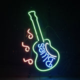 Neon sign shaped like a green-outlined guitar with blue 'Blues' text inside and three red musical notes to the left against a dark background.